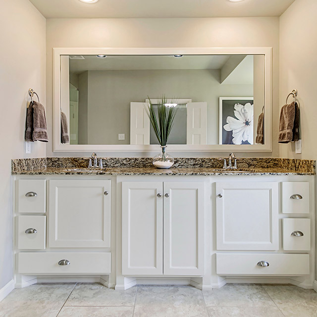 Modern bathroom with custom cabinets in Leander, TX, designed by Total 3D Laminate LLC.